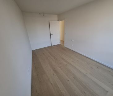 Nieuwbouwappartement in het centrum met terras en 2 autostaanplaatsen - Photo 5