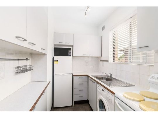 Freshly Painted Bright Fully Furnished Studio with LUG - Photo 1