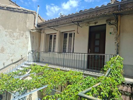 Location Appartement 2 pièces 61m² NIMES 30900 - Photo 4
