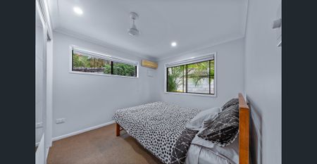 Perfect family home with spacious backyard and greenery - Photo 4