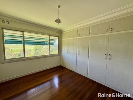 ELEVATED FARMHOUSE WITH SHED - Photo 5