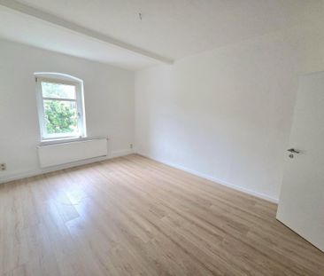 Schicke 3-Zimmer-Dachgeschosswohnung in zentraler Lage von Stollberg! - Photo 2