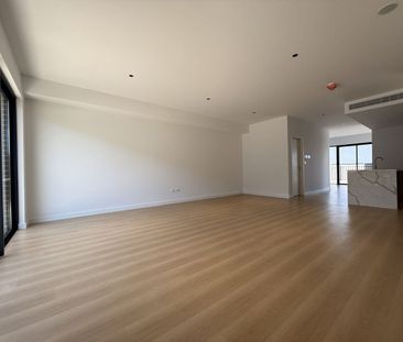 Spacious Three-Level Townhouse with Workshop & Dual Outdoor Living - Photo 2