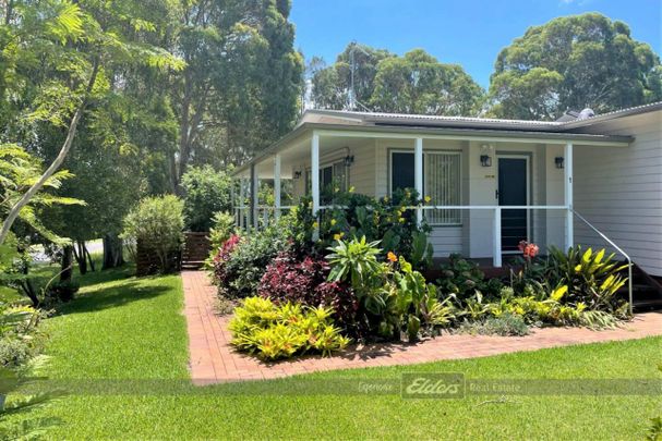 THREE BEDROOM HOME IN TRANQUIL GREEN POINT - Photo 1