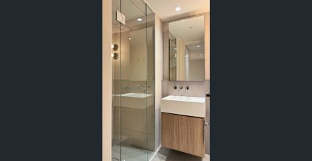 Elegant 1-Bedroom Residence in Prestigious Queens Place – with Premium Appliances 13F / 157 A’Beckett Street, Melbourne VIC 3000 - Photo 3