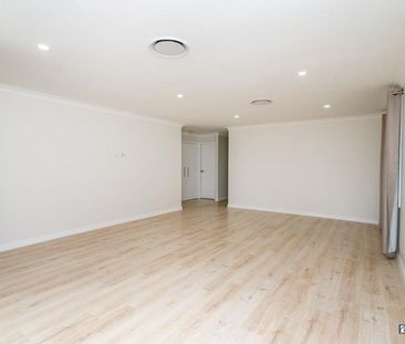 Family Comfort in a Quiet Glenmore Park Cul-de-sac - Photo 4