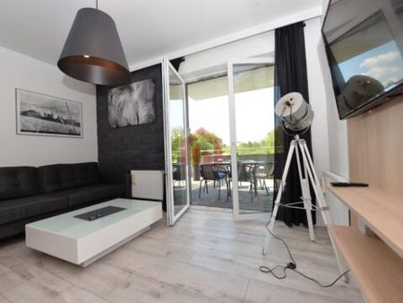 Mieszkanie z widokiem na zieleń i z miejscem postojowym - Photo 3