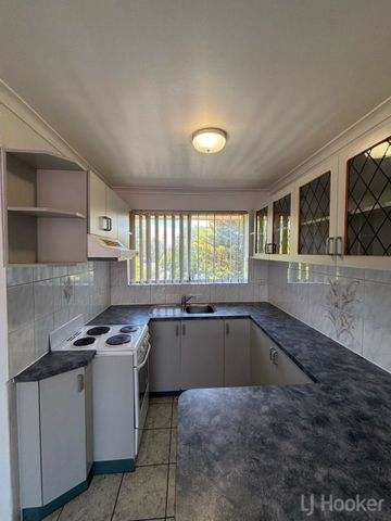 Two Bedroom Top Floor Unit - Photo 2