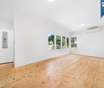 Charming Three-Bedroom Home with Freshly Landscaped Gardens - Photo 4