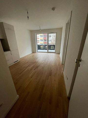 KfW 40-Neubau-Wohnung mit EBK, Balkon, Echtholzparkett, HWR, Fahrstuhl, Tiefgarage - Foto 2