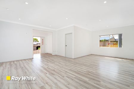 Modern 3 Bedroom Brick Home - Photo 2