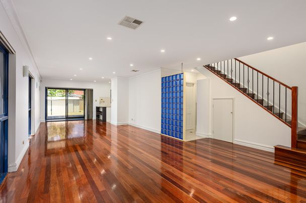 Stylish Entertainer's Duplex in a Lifestyle Location - Photo 1