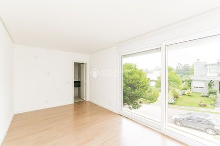 Casa em Condomínio com 4 quartos e 250m² para alugar em Vila Nova, Porto Alegre. - Foto 2