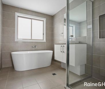 Spacious 4 Bedroom Family Home with Multiple Living Areas - Photo 3