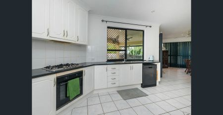 Spacious Four-Bedroom Family Oasis with Pool in Prime Kirwan Location! - Photo 5