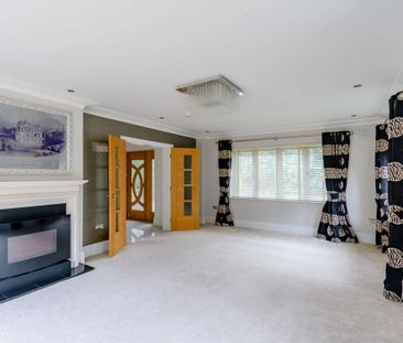 A spacious five‑bedroom detached home set behind electric gates on ... - Photo 2