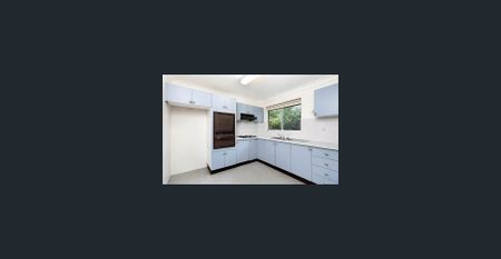 Top floor two bedroom unit with tandem garage - Photo 3