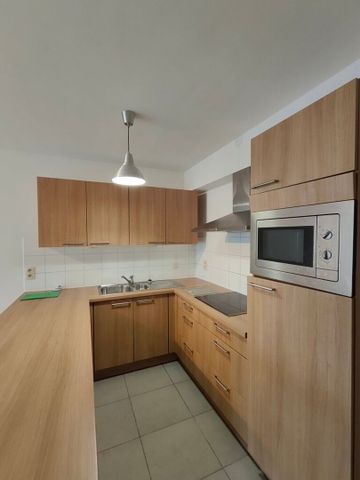 Gelijkvloers app. met 1 slaapkamer en autostaanplaats! - Foto 3