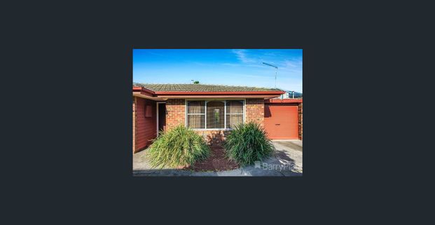 Perfectly Positioned Two-Bedroom Gem - Photo 1