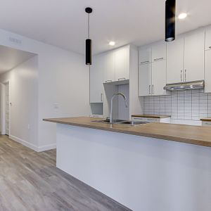 Grand 4 1/2 Au Rez-de-jardin - Photo 2