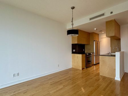 Île-des-Soeurs : condo de 1 chambre avec superbe vue et stationnement intérieur ! - Photo 3