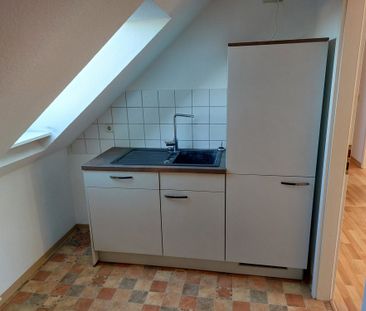 Gemütliche 2-Raumwohnung im Dachgeschoss mit EINBAUKÜCHE - Foto 4