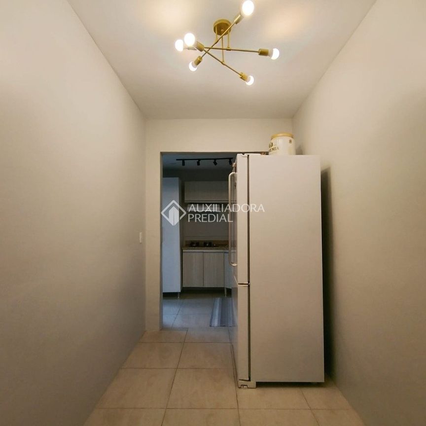 Casa em Condomínio com 2 quartos e 50m² para alugar em Moinhos de Vento, Canoas. - Photo 1