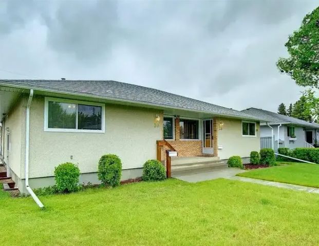 Newly legalized 2-bedroom basement unit in Rosscarrock | 28 Rossmount Road Southwest, Calgary - Photo 1