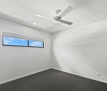 Located in popular Harmony Estate, Palmview is this stunning three ... - Photo 4