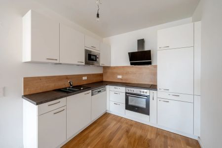 Ihr Rückzugsort im Grünen – 2-Zimmer-Wohnung mit Balkon und Tiefgaragenparkplatz - Photo 3