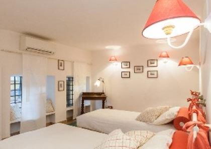 Center-Historic Jewish Quarter: Elegant apartment situated in beautiful Palazzo Nobiliare. Entrance, spacious living with original wood frescoed ceilings, large modern dining and kitchen, 4 bedrooms, 4 Baths, small terrace. #1527