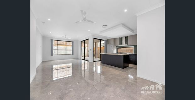 STUNNING, STYLISH AND MASSIVE BRAND-NEW HOME WITH ALL THE BELLS AND WHISTLES! - Photo 1