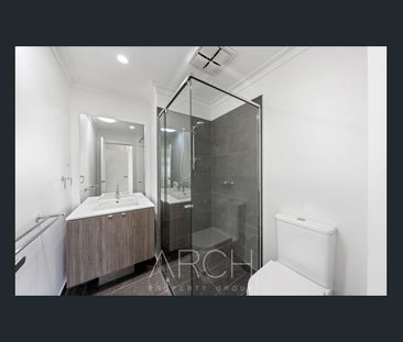 Stylish Townhome Offering Comfort and Space! - Photo 2