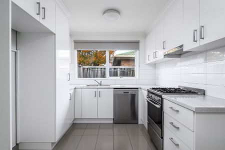 TWO BEDROOM SPACIOUS UNIT WITH DOUBLE GARAGE - Photo 2