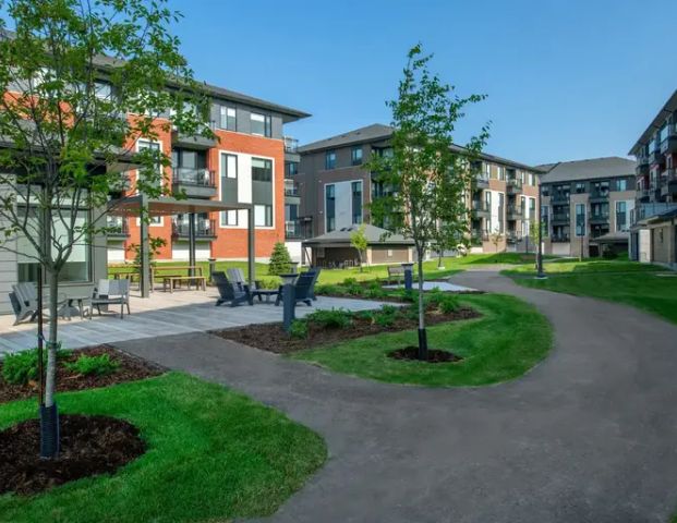 Wateridge Village Apartments by Uniform Living | 530 Pimiwidon Street, Ottawa - Photo 1