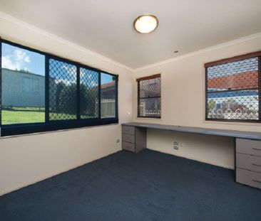 The Whole Package! Spacious 5-Bedroom Home + Sheds Galore! - Photo 5
