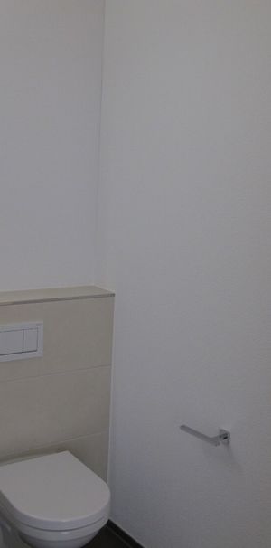 2.5-Zimmerwohnung im EG mit Gartensitzplatz - Foto 1