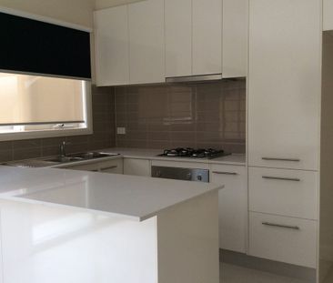 Register to Inspect // Stylish Two-Bedroom Townhouse with Dual Livi... - Photo 3