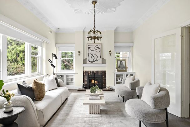 Family-Sized Art Deco Classic on a Prime Corner offering Comfort & Character - Photo 1