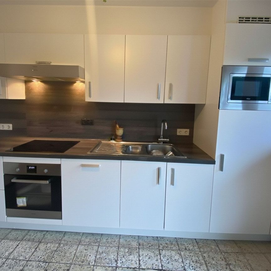 Gelijkvloers appartement met twee slaapkamers en garagebox. - Photo 1