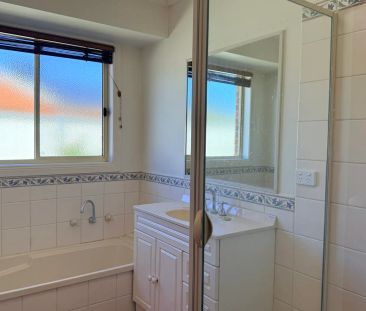 Comfortable Family Living with Large Yard & Entertaining Area - Photo 5