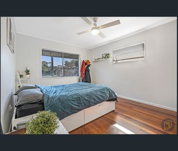 Flawlessly Renovated Family Haven with Dual-Level Flexibility - Photo 5