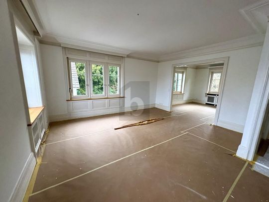 QUIET, CENTRAL, LIGHT-FLOODED WITH LAKE VIEW - Photo 1