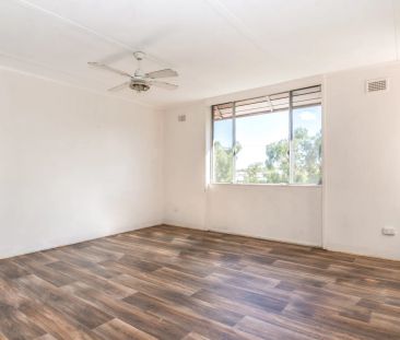 Bright and Spacious Top-Floor Unit - Photo 3