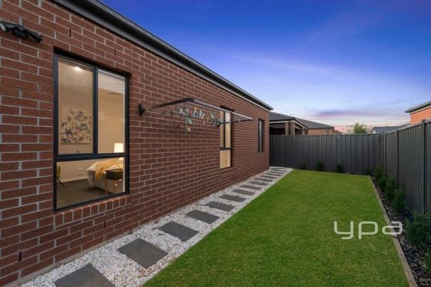 Modern 4-Bedroom Home in a Prime Location - Photo 1