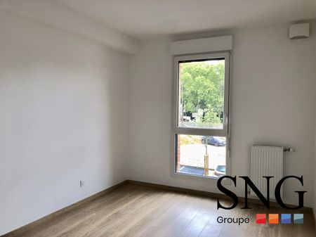 T3 AVEC LOGGIA ET PARKING - Photo 3