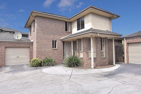 Immaculate Three-Bedroom Home in Prime Location - Photo 2