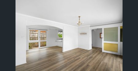 Spacious 3-Bedroom Unit in Prime Location - Photo 3