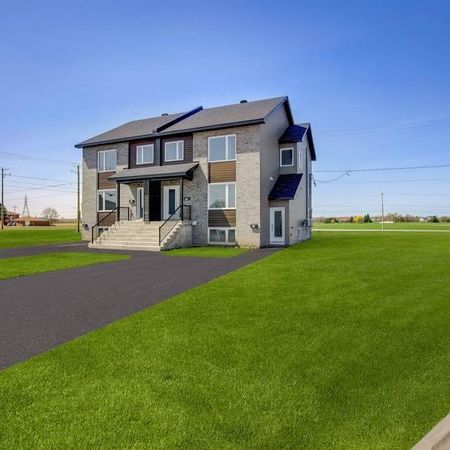 Beau 4 1/2 neuf, demi sous-sol, style semi-détaché ! - Photo 4