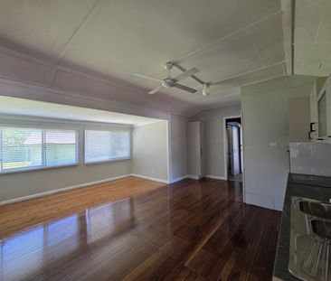 Freshly Updated Home in a Tranquil Riverside Setting - Photo 1